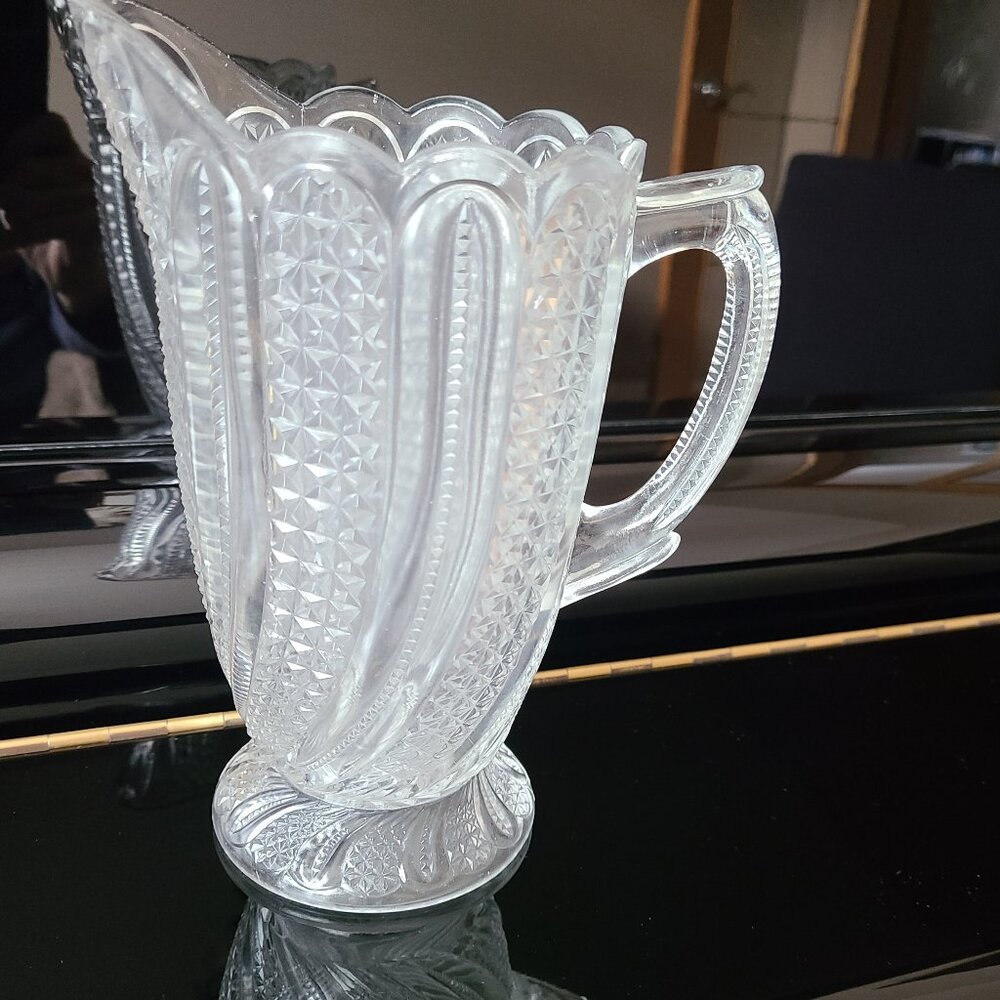 Antique clear glass pitcher EAPG Victorian Mckee Bros Doric swirl pattern.